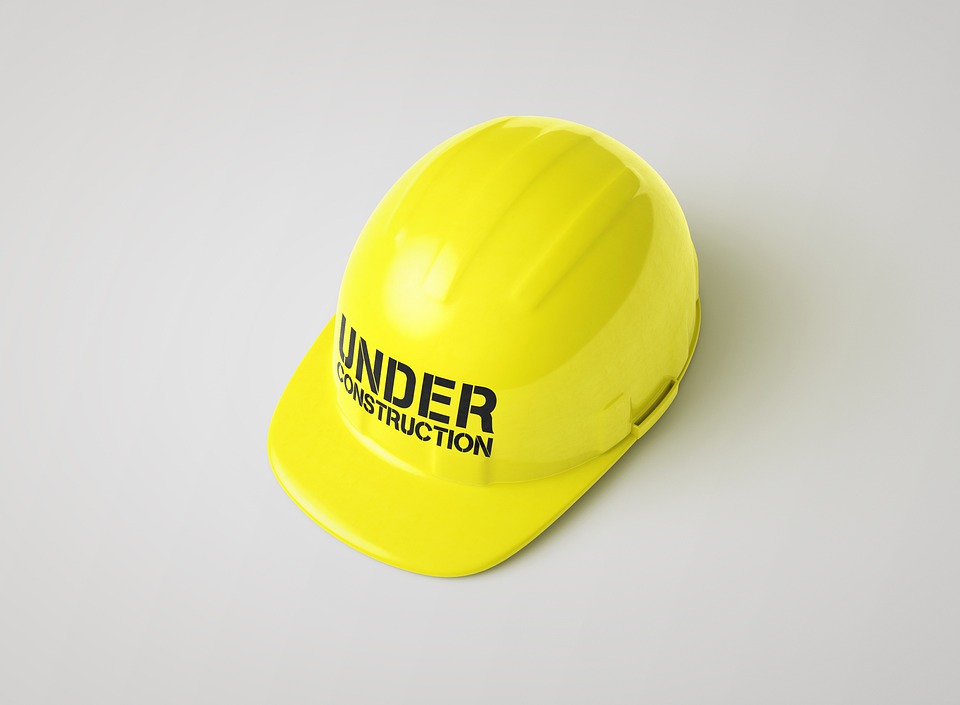 Hard Hat With Under Construction Written | Accidents at Work