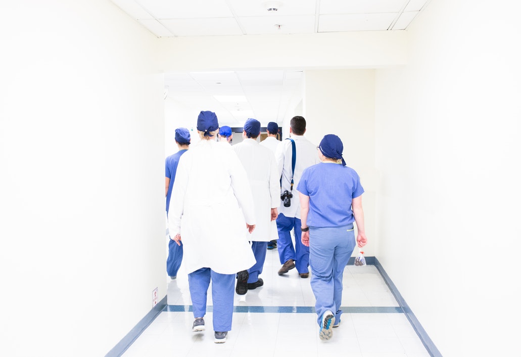 Doctors Walking in Hospital Corridor | Medical Negligence