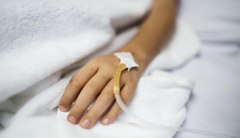 Person in Hospital with IV | Medical Negligence